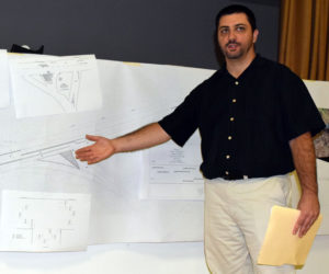 Matt Philbrick gestures to a diagram as he explains the Maine Department of Transportation's plan for improvements to the intersection of Route 1 and Route 27 in Edgecomb during a public hearing at the Edgecomb town hall Tuesday, Oct. 10. (J.W. Oliver photo)