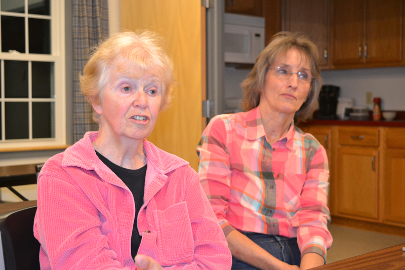 Whitefield residents Libby Harmon (left) and Lucy Martin weigh in during the portion of the Tuesday, Oct. 10 meeting of the Whitefield Board of Selectmen concerning a recent accident involving a motor vehicle and a horse-and-buggy. (Christine LaPado-Breglia photo)