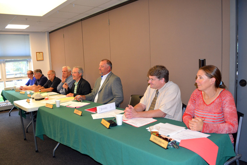 The Maine Yankee Community Advisory Panel on Spent Nuclear Fuel Storage and Removal meets at the Wiscasset Community Center on Oct. 10. From left: Misty Parker, Chris Johnson, Ralph Keyes, Dan Thompson, Chair Don Hudson, Wayne Norton, Jay Hyland, and Stacy Linehan. (Charlotte Boynton photo)