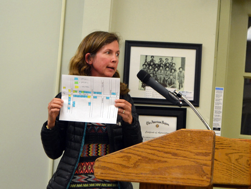 Wiscasset business owner Cordelia Oehmig shows the Wiscasset Board of Selectmen a survey of downtown business owners demonstrating opposition to the Maine Department of Transportation's current proposal for the downtown traffic project. (Charlotte Boynton photo)