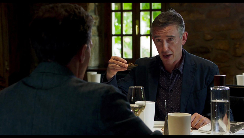 Steve Coogan (right) in a scene from "The Trip To Spain," playing this weekend at Harbor Theater.