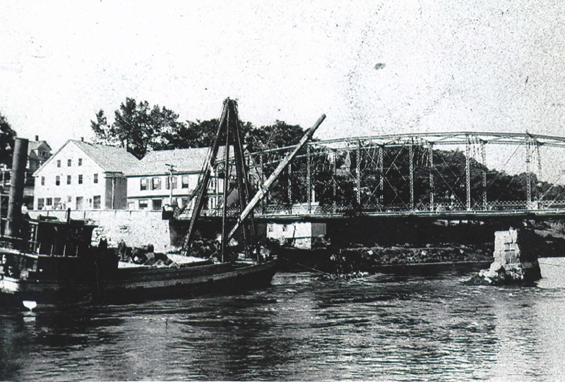 The area near the Damariscotta-Newcastle bridge as Thomas Gay remembered it. The new steel bridge had been built. The two buildings across from Gay's store, bought by John Sproul, show clearly to the left of the bridge. These are are two of the few old buildings still surviving in the area.