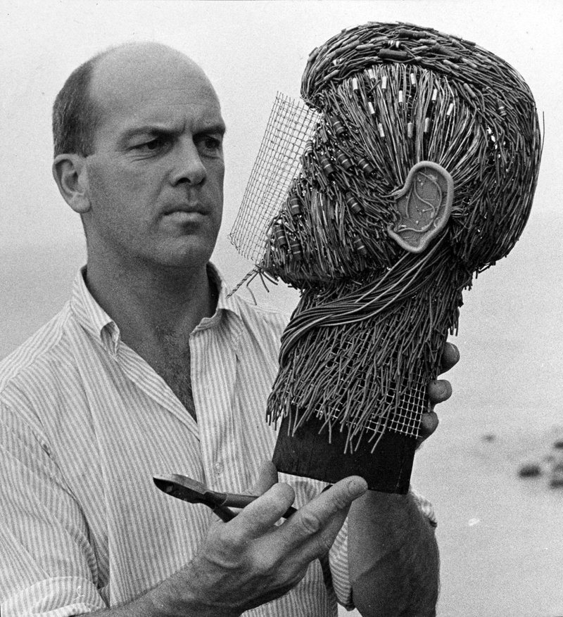 Ralph Moxcey works on a sculpture for Time magazine.