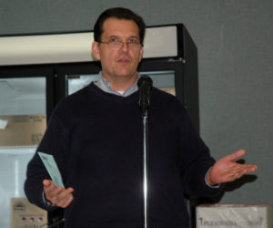 Bill Card, of Bristol, a member of the Lincoln Academy Class of 1980, speaks during the AOS 93 forum about Lincoln Academy at Great Salt Bay Community School in Damariscotta on Wednesday, Nov. 15. (Alexander Violo photo)