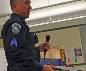 Damariscotta Police Sgt. Erick Halpin speaks during a community conversation about the regulation of recreational marijuana businesses at Great Salt Bay Community School on Tuesday, Nov. 16. (Maia Zewert photo)