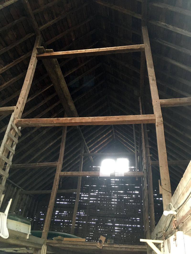 Breaks can be seen in four of the six upright supports of DRAs hay barn, which are visibly leaning to one side.