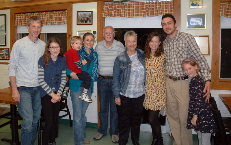 Moody's Diner co-owner Steve Moody (center) poses with family members during his retirement party at the diner Monday, Oct. 30. From left: Will Truesdell, Julia Truesdell, Myles Truesdell, Lisa Truesdell, Stephen Moody, Candace Moody, Linsey Moody, Travis Thiboutout, and Hannah Thiboutot. (Alexander Violo photo)