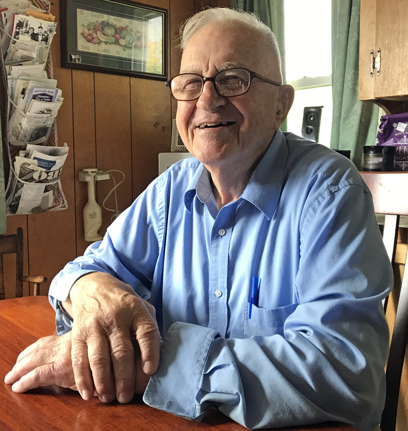 World War II veteran Albert R. Boynton reminisces about his experiences in the U.S. Navy at his kitchen table in North Whitefield. (J.W. Oliver photo)