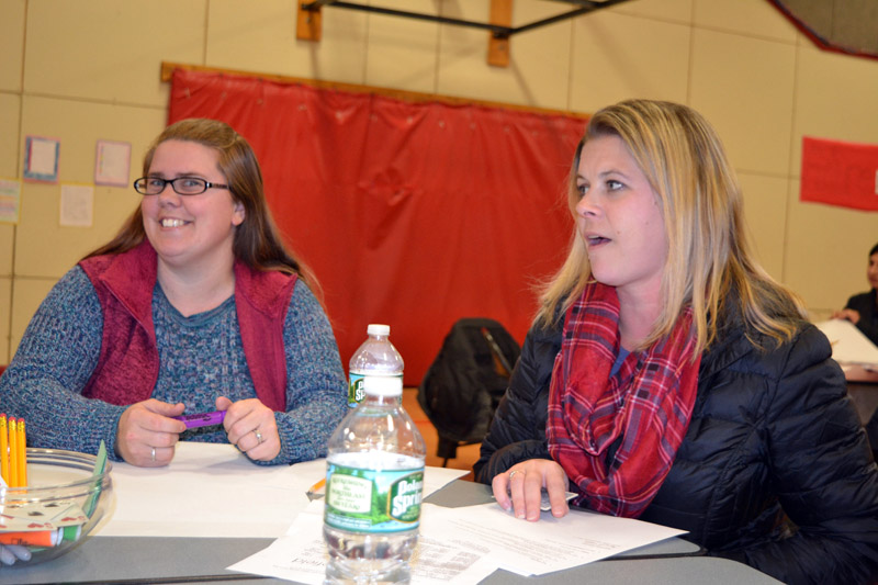 Whitefield Elementary School parents Nikki Ripley (left) and Shannon Peaslee talk about the dwindling numbers of PTA members during a discussion session at the Nov. 15 community forum. (Christine LaPado-Breglia photo)