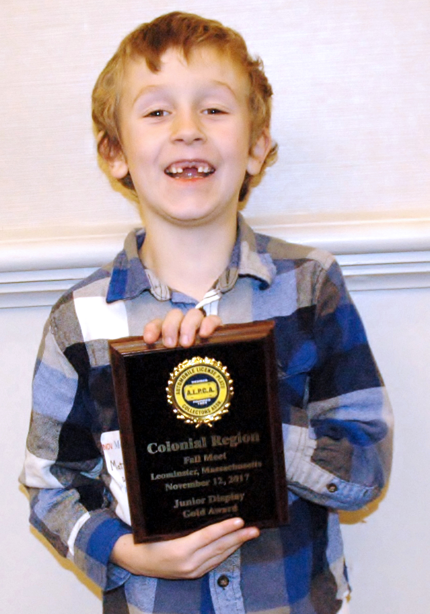 Matthew Roberts, 6, of Damariscotta, captured gold in the Youth Division with his license plate display at the Colonial Region fall meet of the Automobile License Plates Collectors Association.