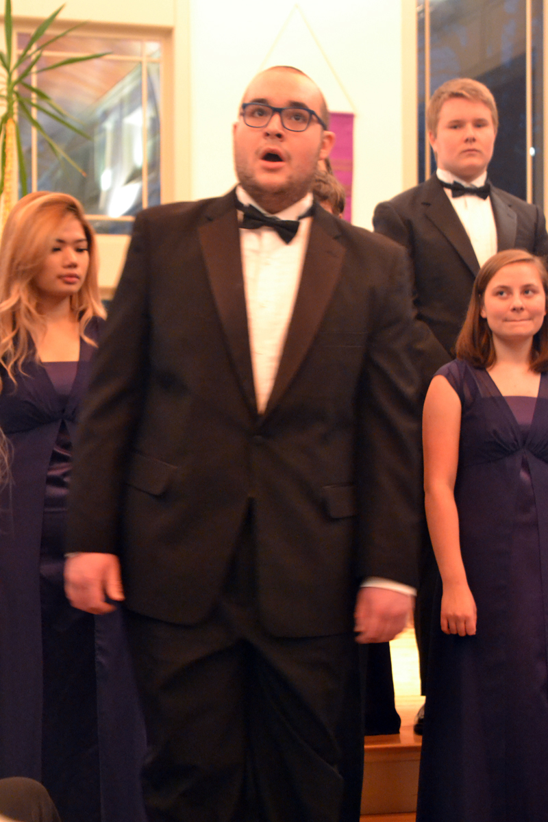 Lincolnaire Miles Jackson (center) performs "O Come All Ye Faithful" at the "Sounds of the Season" concert Sunday, Dec. 10 as other Lincolnaires look on. (Christine LaPado-Breglia photo)