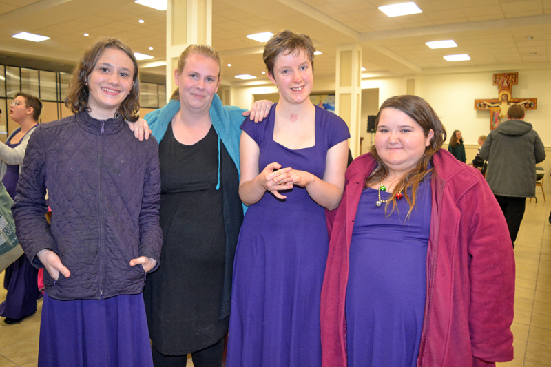 From left: Lincoln Academy Concert Choir member Sierra Henderson, special education ed tech Morgan Brewer, and LA Concert Choir members Lydia LaPado and Tiffany Murray relax backstage after the Sunday, Dec. 10 "Sounds of the Season" concert at St. Patrick's Catholic Church in Newcastle. (Christine LaPado-Breglia photo)