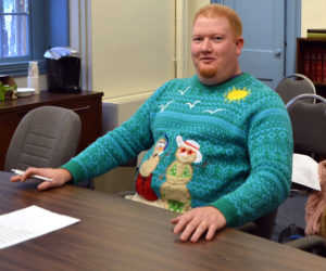 Lincoln County Emergency Management Agency Director Casey Stevens wears a Christmas sweater to a meeting of the Lincoln County Board of Commissioners on Tuesday, Dec. 19. "I have to wear this sweater at least one time during the Christmas season," he said. (Charlotte Boynton photo)