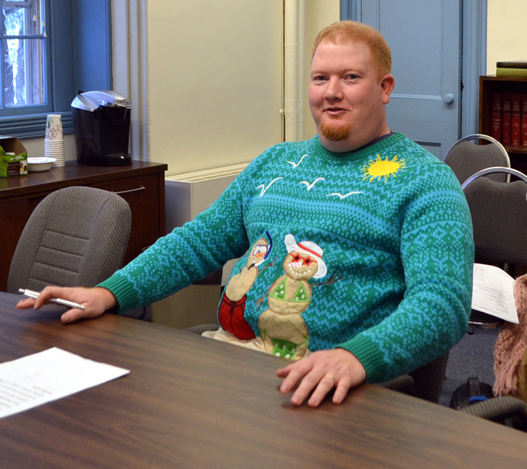 Lincoln County Emergency Management Agency Director Casey Stevens wears a Christmas sweater to a meeting of the Lincoln County Board of Commissioners on Tuesday, Dec. 19. "I have to wear this sweater at least one time during the Christmas season," he said. (Charlotte Boynton photo)