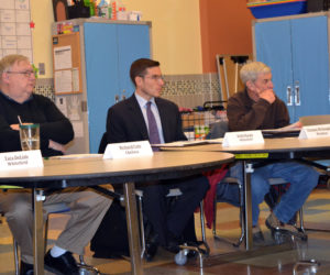 From left: RSU 12 Board of Directors members Richard Cole, of Chelsea; Keith Marple, of Whitefield; and Thomas McNaughton, of Windsor; listen to a presentation by Superintendent Howard Tuttle during a meeting at Chelsea Elementary School on Thursday, Dec. 14. (Christine LaPado-Breglia photo)