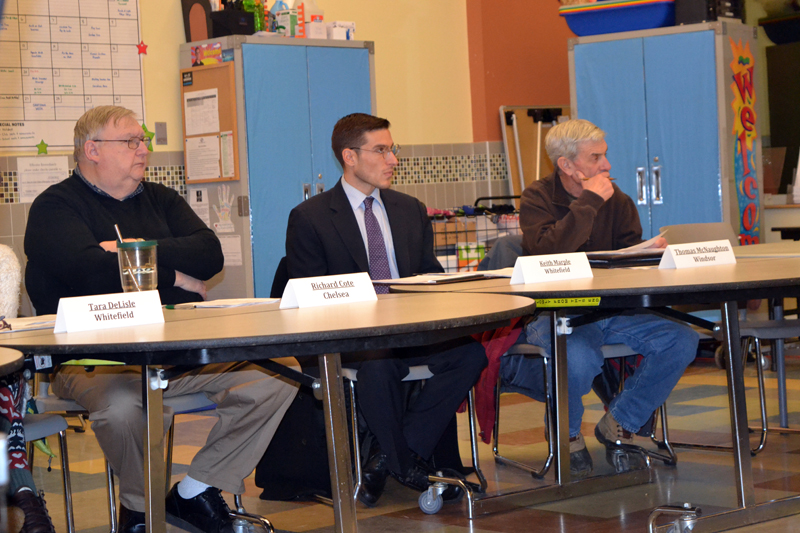 From left: RSU 12 Board of Directors members Richard Cole, of Chelsea; Keith Marple, of Whitefield; and Thomas McNaughton, of Windsor; listen to a presentation by Superintendent Howard Tuttle during a meeting at Chelsea Elementary School on Thursday, Dec. 14. (Christine LaPado-Breglia photo)