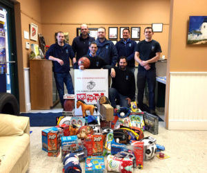 The team at Atlantic Motorcar Center in Wiscasset is conducting a toy drive for needy children.