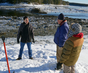 From left: Ian Riley, of American Concrete Industries Inc., talks with Bremen Selectmen Boe Marsh and Wendy Pieh during a meeting at the Storer Road boat ramp Wednesday, Dec. 27. (Matthew Mitterhoff photo)