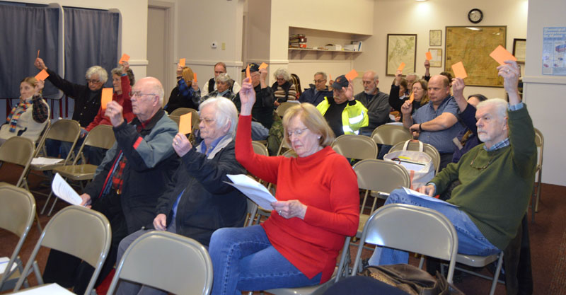 Bremen voters approve an article at town meeting Thursday, Jan. 11. (Alexander Violo photo)