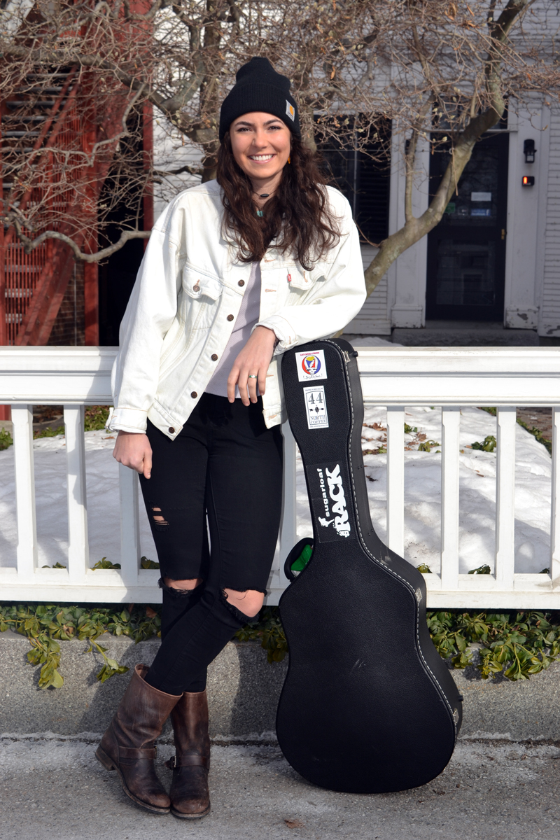 Lena Rich strikes a pose with her guitar in downtown Damariscotta. (Christine LaPado-Breglia photo)