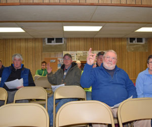 A small group of Edgecomb voters approve the appropriation of $35,678 from surplus to cover storm cleanup during a special town meeting at the town hall Tuesday, Jan. 16. (J.W. Oliver photo)