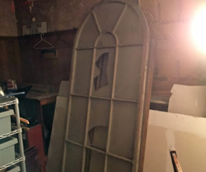 One of the windows that was found under the Lincoln Theater stage. "We had to break a hole in the wall to recover it," said Lincoln Theater Executive Director Andrew Fenniman. "It is being restored and being put back up on the Main Street side of the building." (Photo courtesy Lincoln Theater)