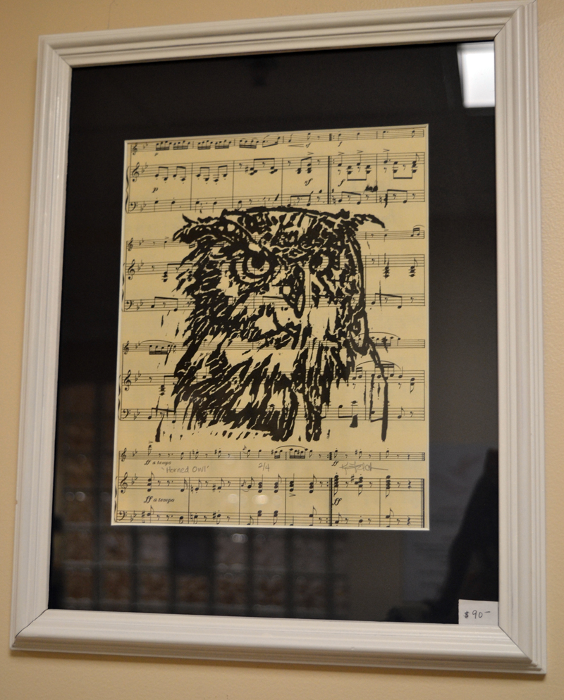 Untitled print of owl's head on recycled sheet music by Union printmaker Kathy Felch. (Christine LaPado-Breglia photo)