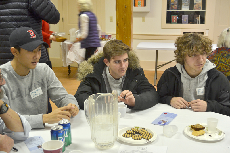 From left: Lincoln Academy students Min Choi, Jorge Pulido Fernandez, and Eduardo Martin-Chico participate in a discussion about racism at The Second Congregational Church in Newcastle on Monday, Jan. 15. (Maia Zewert photo)