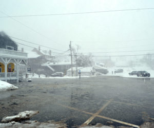 Water from the Damariscotta River floods the municipal parking lot in downtown Damariscotta the afternoon of Thursday, Jan. 4. (Maia Zewert photo)