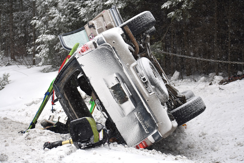 The scene of a rollover on Route 1 in Waldoboro after firefighters and emergency medical services personnel extricated two occupants from the SUV. (Alexander Violo photo)
