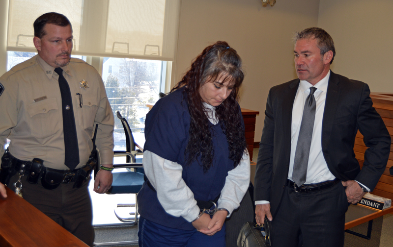 Lincoln County Sheriff's Deputy James Read and defense attorney Philip S. Cohen flank Shawna L. Gatto during a court appearance in Rockland on Thursday, Jan. 25. (Greg Foster photo)