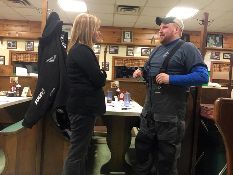 Mary Mayhew speaks with Dustin Delano at Moody's Diner in Waldoboro.