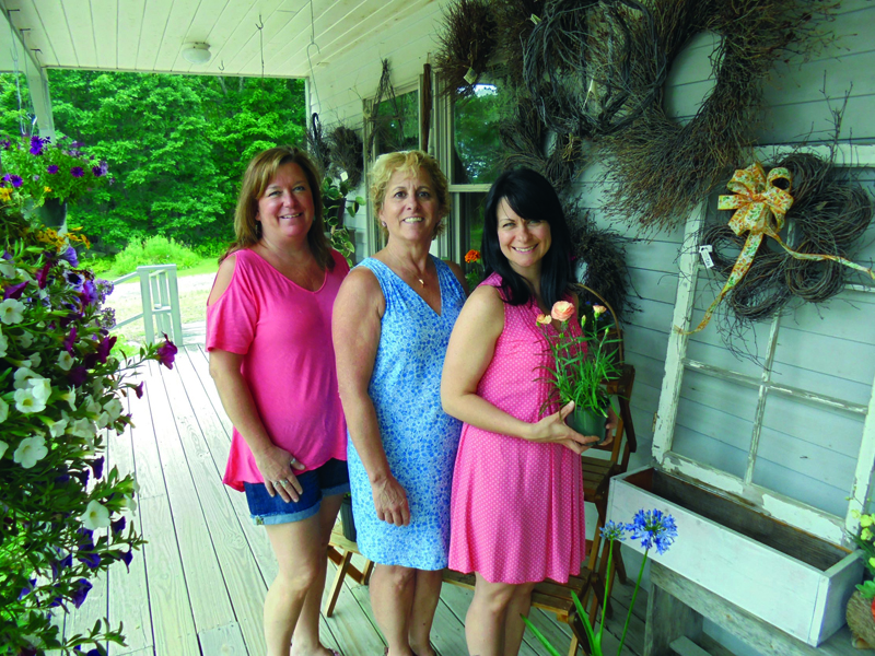 Shelley Pease (center) and her two longtime employees, Leeanne Mank (left) and Lorielle Barter (right). (Photo courtesy Shelley's Flowers & Gifts)