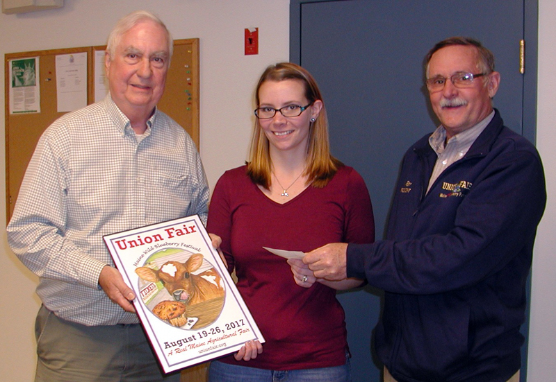 From left: George Gross, Union Fair -- Maine Wild Blueberry Festival poster committee chair, holds the 2017 Union Fair poster while poster winner Alyssa Willey, of Warren, accepts a $500 check from Union Fair -- Maine Wild Blueberry Festival President Ron Hawes for her winning design. (Photo courtesy John Jensen)