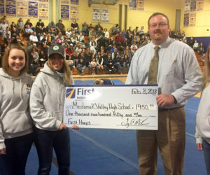 Medomak Valley High School in Waldoboro recieves a First Hoop donation from First National Bank.