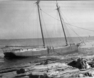 Women look at the two-masted schooner Willis and Guy that wrecked on the rocks of Pemaquid Point on Aug. 17, 1917. The original negative of this image was shared with the Old Bristol Historical Societys digital images archive by Mollie Perley.