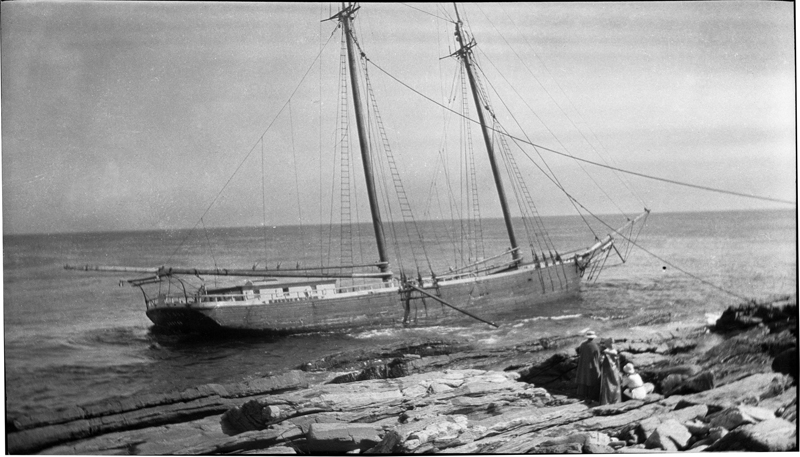 Women look at the two-masted schooner Â“Willis and GuyÂ” that wrecked on the rocks of Pemaquid Point on Aug. 17, 1917. The original negative of this image was shared with the Old Bristol Historical SocietyÂ’s digital images archive by Mollie Perley.