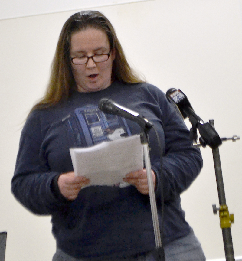 Alna resident Ona Brazwell reads a statement in favor of keeping the town's school choice policy the same during a public hearing Monday, March 5. (Maia Zewert photo)