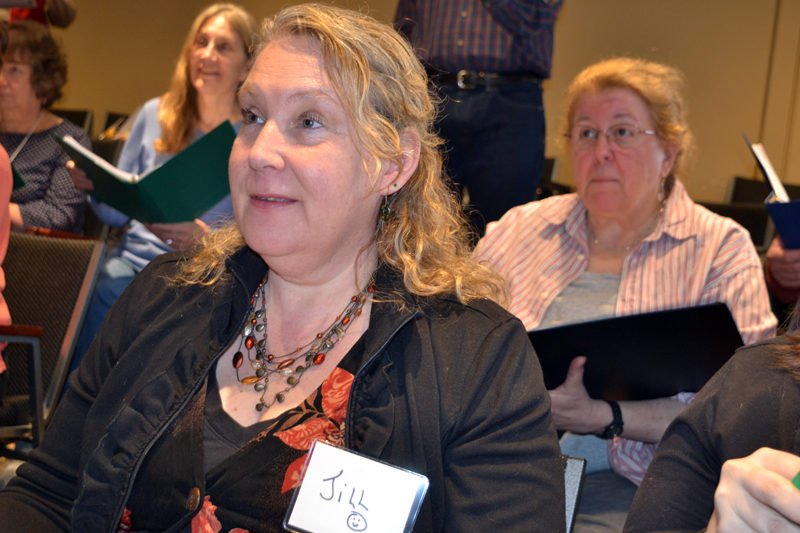 From left: Lynn Drewette, Kay Campbell, Jill Reynolds, and Zora Margolis listen to music director John Mulcahy at the March 25 rehearsal of "9 to 5: The Musical." (Christine LaPado-Breglia photo)