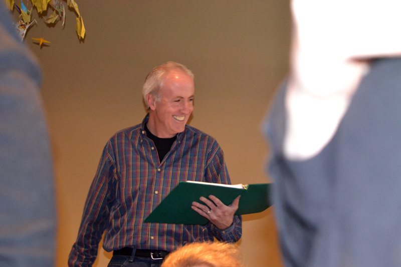Lincoln Theater Executive Director and "9 to 5" chorus member Andrew Fenniman has a light-hearted moment at the March 25 rehearsal for the upcoming show. (Christine LaPado-Bgrelia photo)