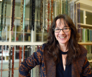 Judy Dumont, the new owner of ABOCA Beads, stands in the store Monday, Feb. 26. (Jessica Picard photo)