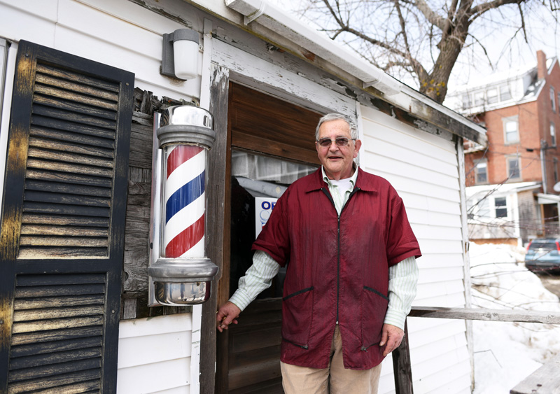 Bruce Soule stands in front of his barbershop in downtown Damariscotta Thursday, March 15. Soule has been cutting hair there for 36 years. (Jessica Picard photo)