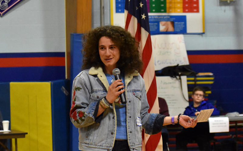 Maine House District 88 candidate Chloe Maxmin, D-Nobleboro, talks to voters at the Democratic caucus in Damariscotta. (Alexander Violo photo)