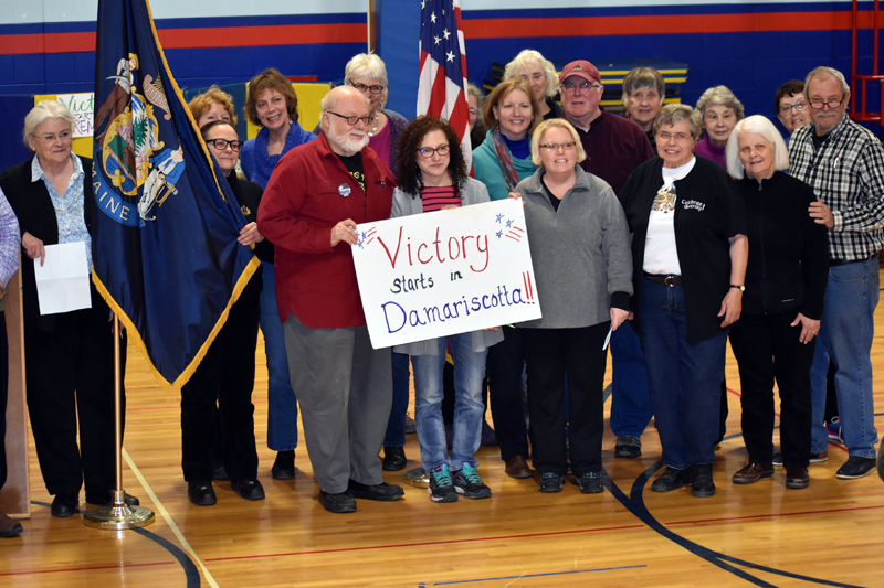 Damariscotta Democrats pose for a photo at the start of the town caucus at Great Salt Bay Community School on Sunday, March 4. (Alexander Violo photo)