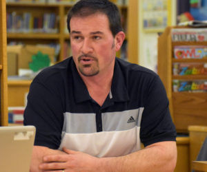 AOS 93 Board Chair Joshua Hatch, of Nobleboro, discusses his desire to work with the Lincoln Academy Board of Trustees to discuss and address the results of the school district's survey about LA. (Alexander Violo photo)