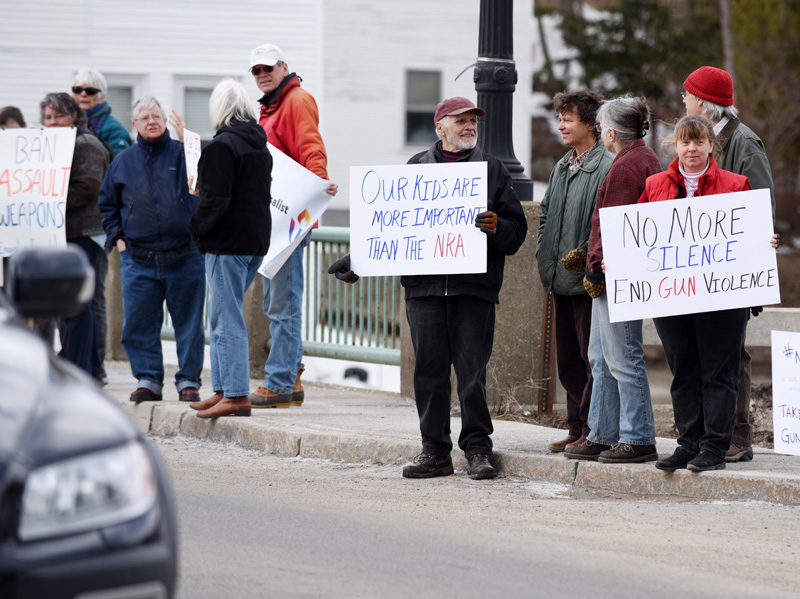Participants in the nationwide March for Our Lives protest line the Damariscotta-Newcastle bridge Saturday, March 24. (Jessica Picard photo)