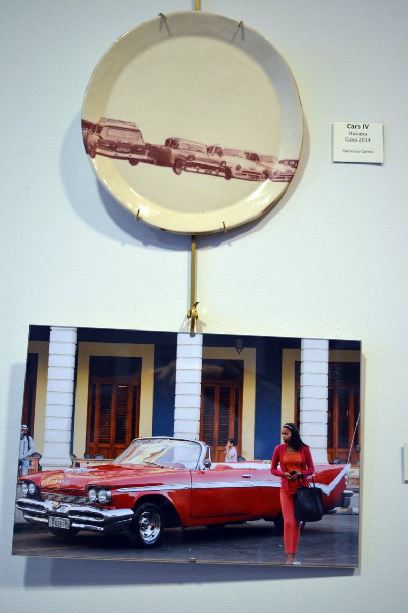 "Cars IV," by Katherine Garren, hangs above "Cars III," by Gisela H. Rhodes, at the "Viva Cuba" photography show on the walls of The Carey Gallery at Skidompha Library. (Christine LaPado-Breglia photo)