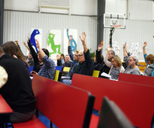 South Bristol residents vote during the annual town meeting at South Bristol School on Wednesday, March 14. (Jessica Picard photo)