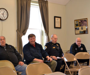 Wiscasset department heads sit in the back row of the town office's meeting room Monday, March 26, ready to explain their budgets to the selectmen and budget committee. From left: Wastewater Treatment Plant Superintendent Buck Rines, Road Commissioner Doug Fowler, Police Chief Jeffrey Lange, and Ambulance Service Director Toby Martin. (Charlotte Boynton photo)