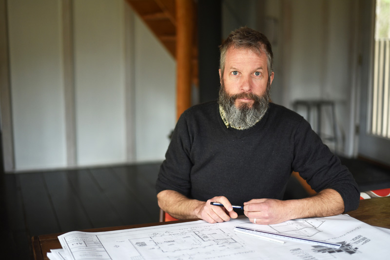 Adam Maltese sits in his Damariscotta home, where he works as an architectural designer, Thursday, April 19. (Jessica Picard photo)